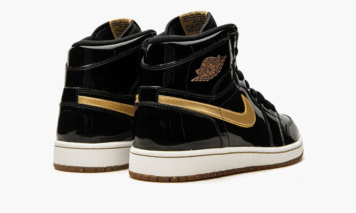 Air Jordan 1 Retro High OG "Black/Metallic Gold" - Angle View 4