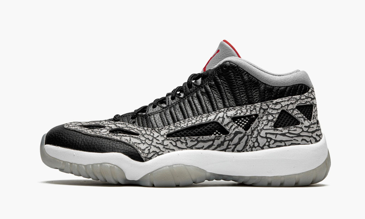 Air Jordan 11 Low IE "Black Cement" - Angle View 2