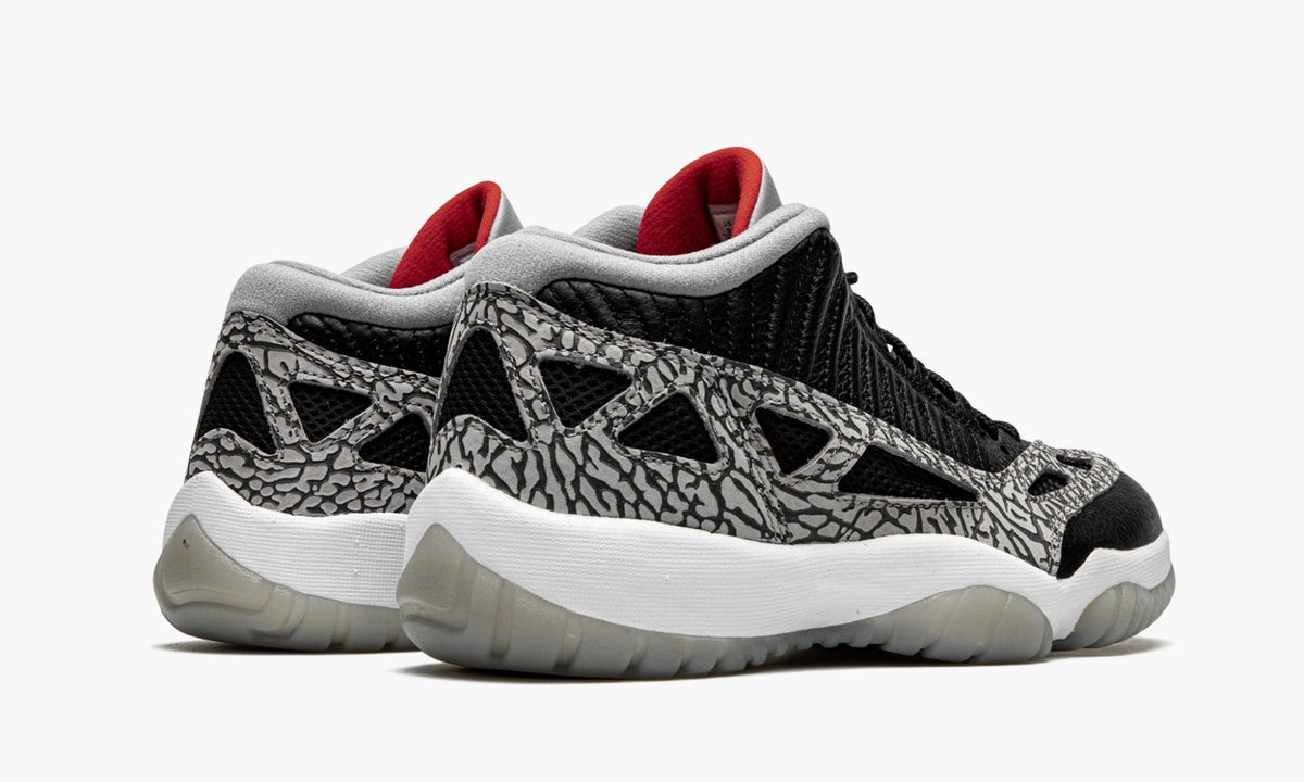 Air Jordan 11 Low IE "Black Cement" - Angle View 4