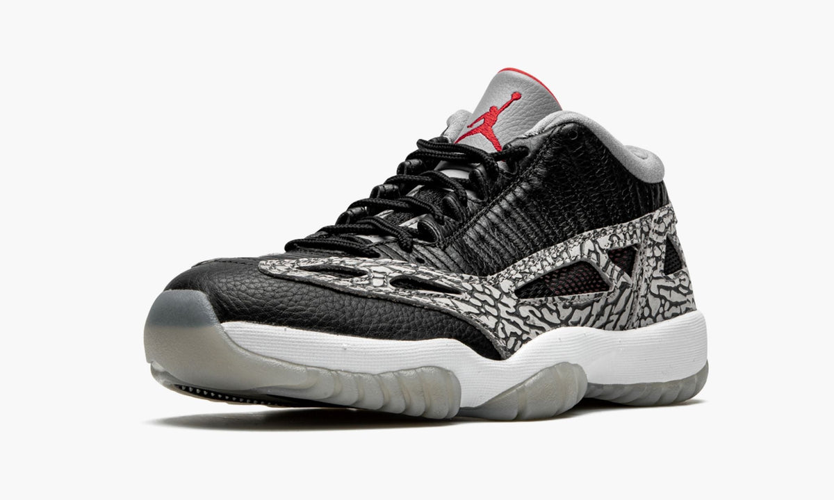 Air Jordan 11 Low IE "Black Cement" - Angle View 5