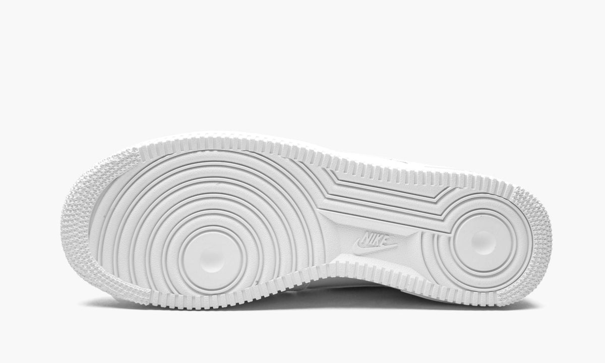 Nike Air Force 1 '07 LV8 "Misplaced Swoosh - Triple White" - Angle View 6