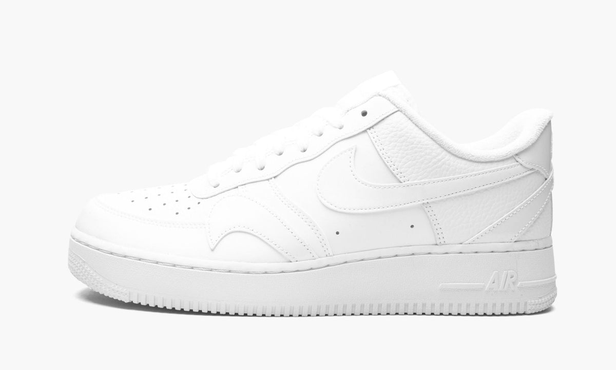 Nike Air Force 1 '07 LV8 "Misplaced Swoosh - Triple White" - Angle View 2