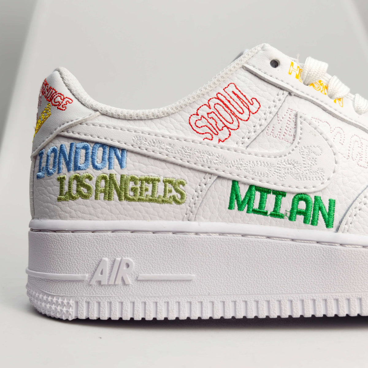 Nike Air Force 1’ 07 Low 'World Tour - White' - Angle View 8
